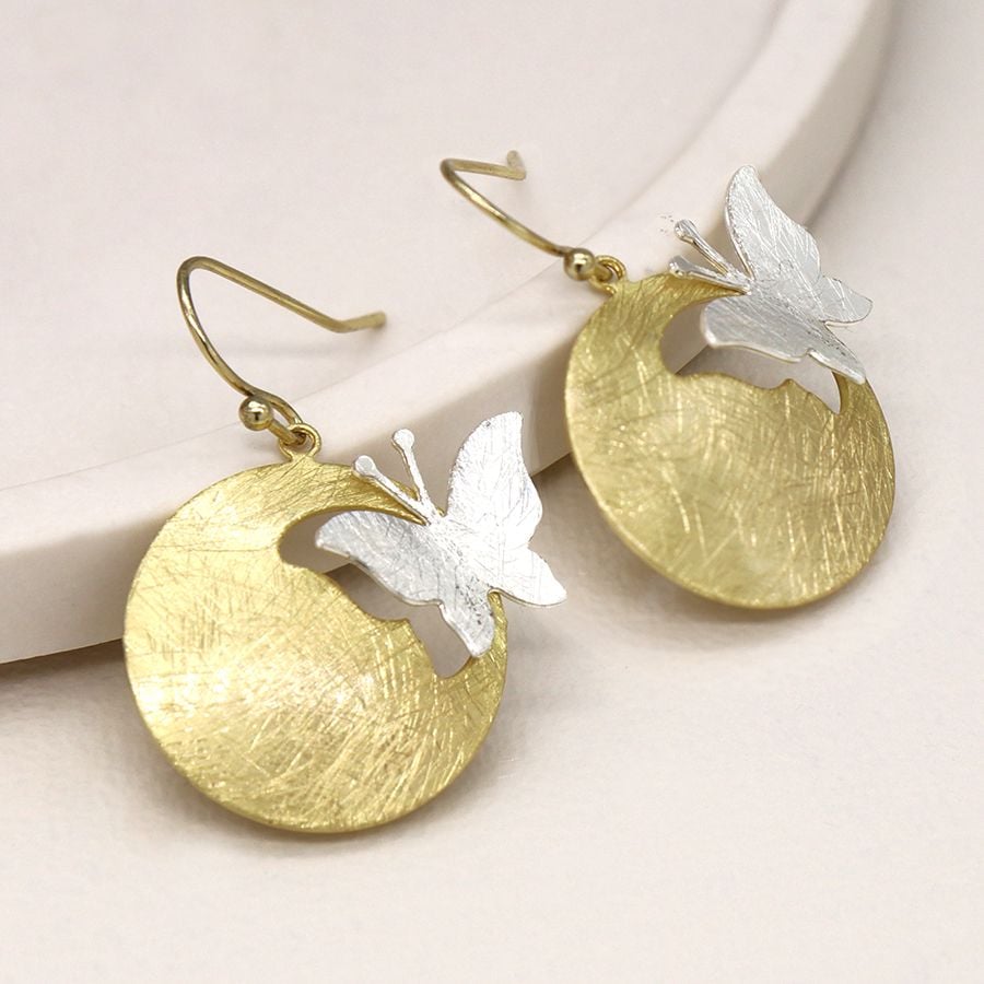 Golden scratched disc and silver plated cut butterfly earrings