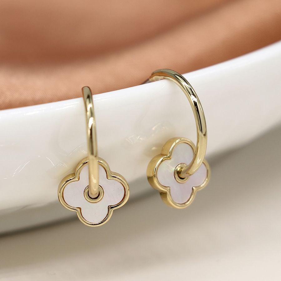 Golden c-hoop quatrefoil earrings