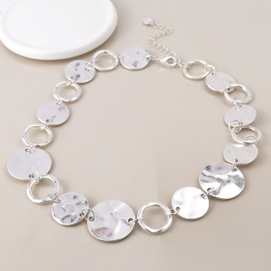 Silver plated worn discs and hoops necklace