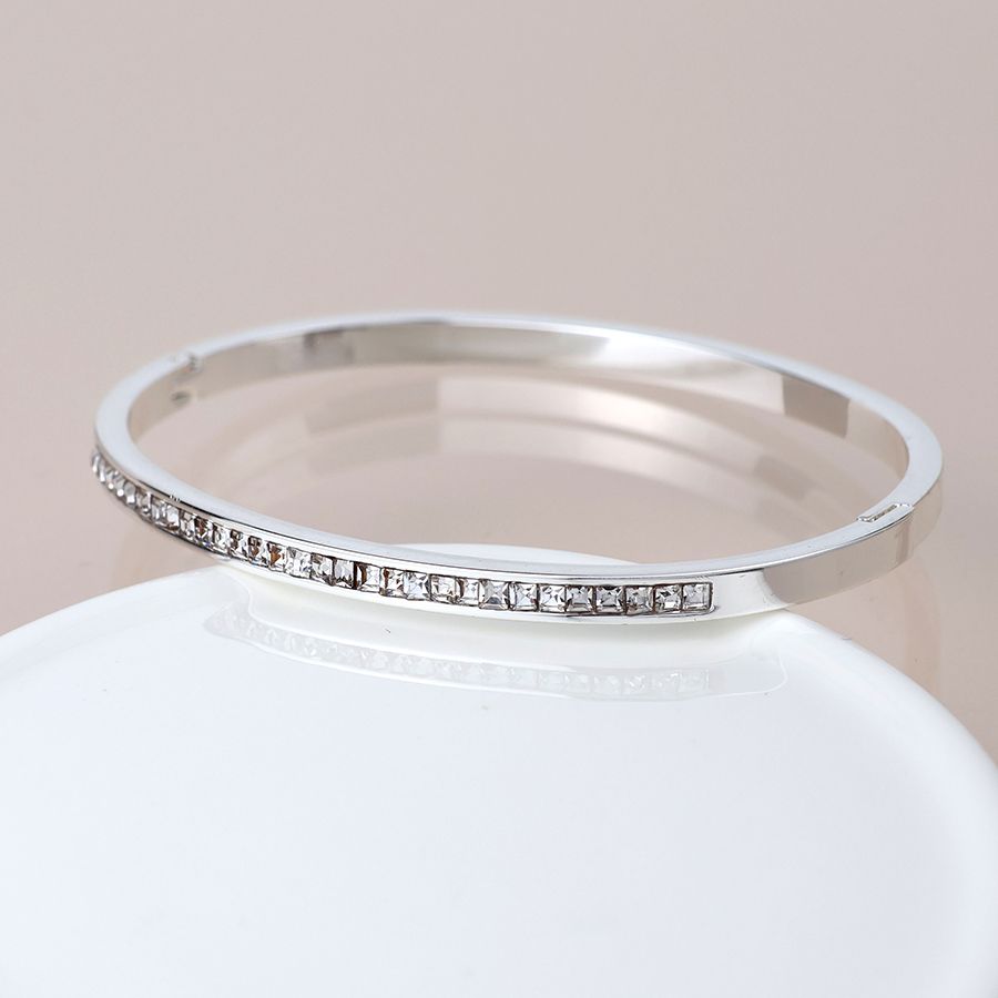 Silver plated clear crystals hinged bangle