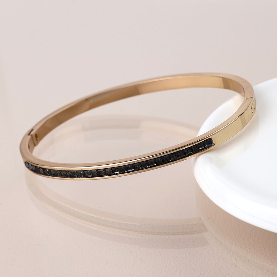 Golden black crystals hinged bangle