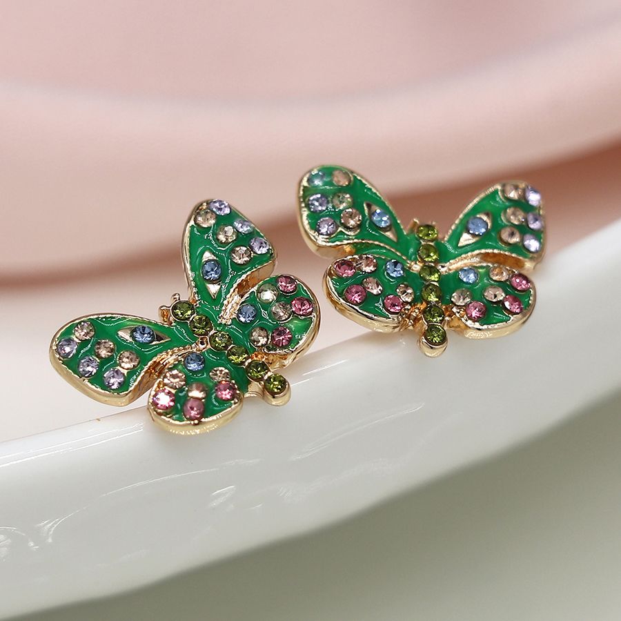 Faux gold plated green enamel and crystal butterfly earrings