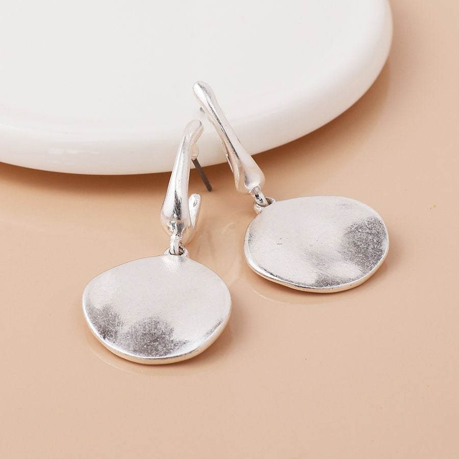 Silver plated worn disc drop earrings