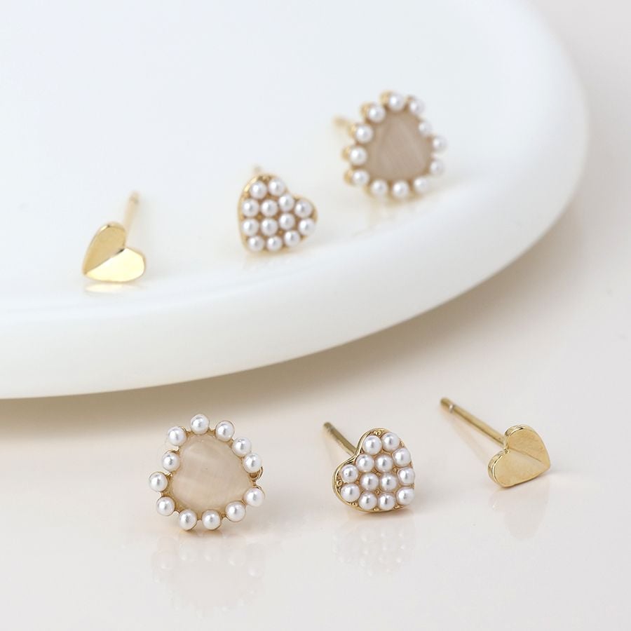Golden triple heart and pearl stud earring set