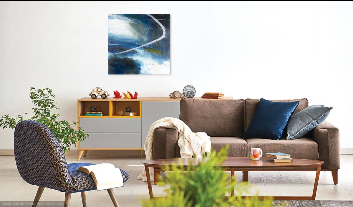 Blue abstract painting with white swirl in lounge