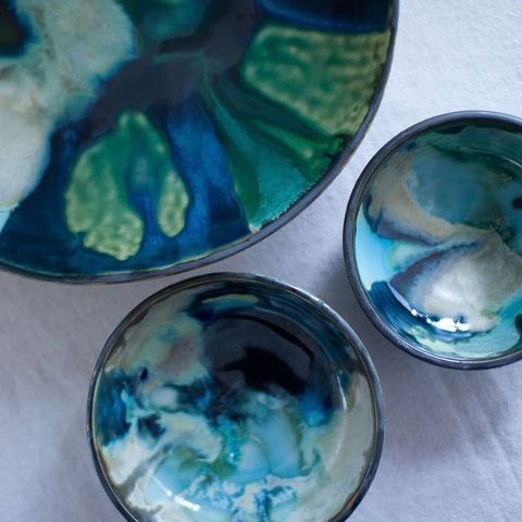 three blue bowls seen from above