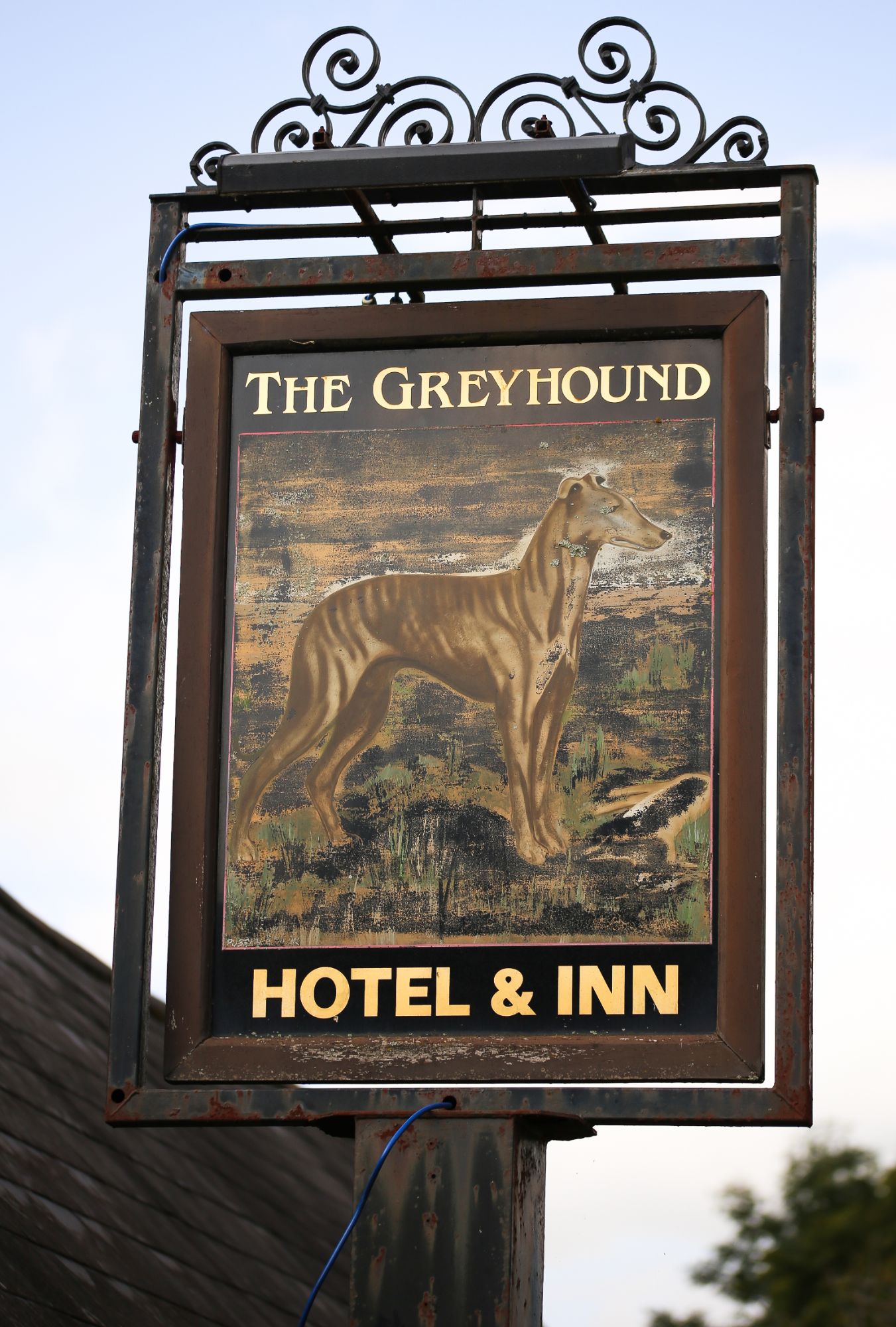 The Greyhound Inn sign
