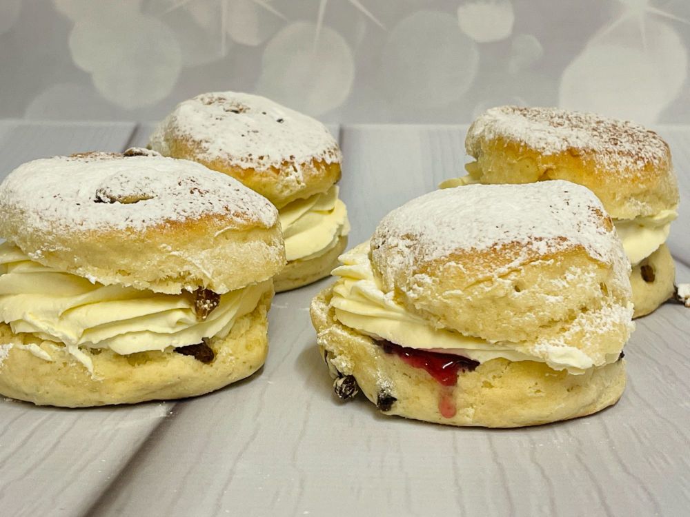 Scone filled with cream and jam