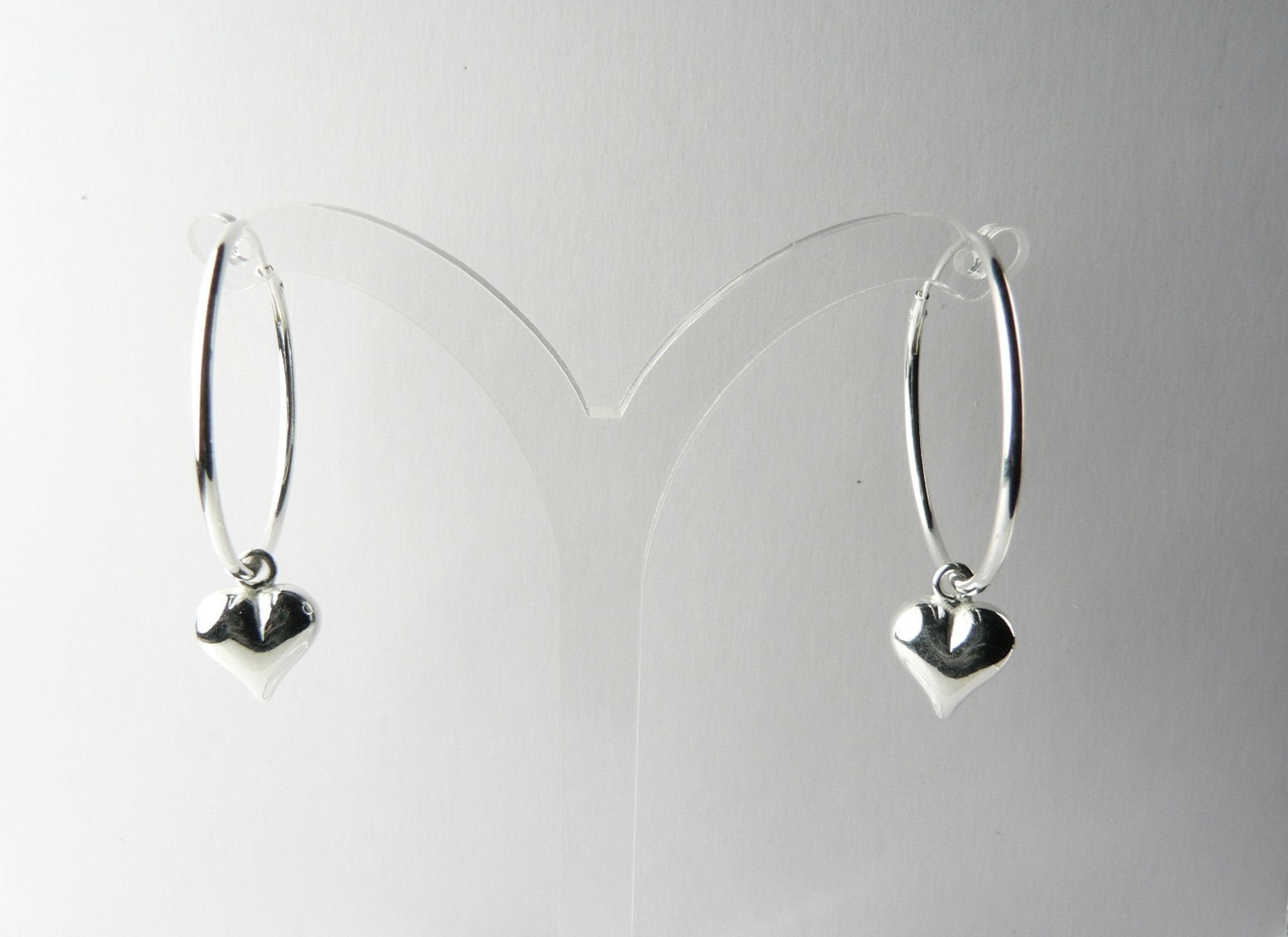 Sterling silver puffed heart hoop earrings