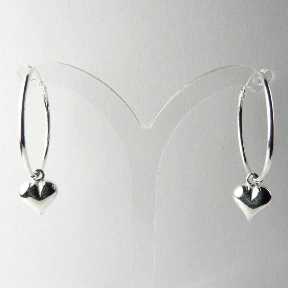 Sterling silver earrings with 9mm puffed hearts, on 24mm hoops, in a gift box