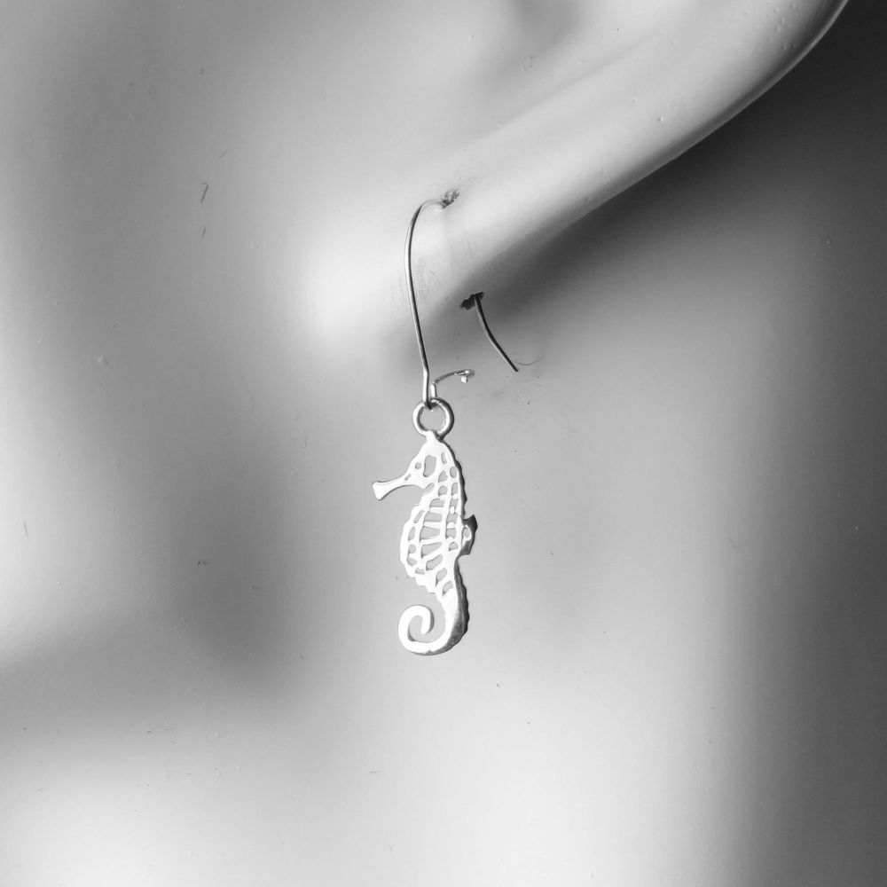 Sterling silver earrings with 19mm seahorse charms, on either fish or kidney wires, in a gift box