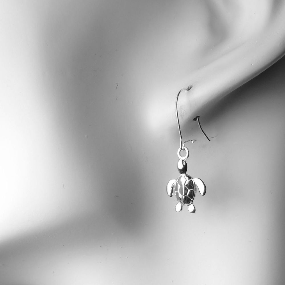 Sterling silver earrings with 13mm turtle charms, on either fish or kidney wires, in a gift box