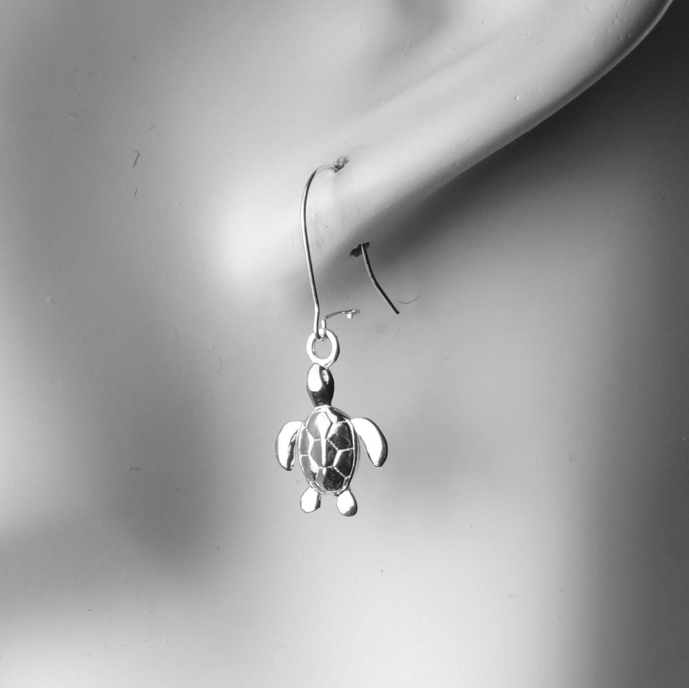 Sterling silver earrings with 13mm turtle charms, on either fish or kidney wires, in a gift box