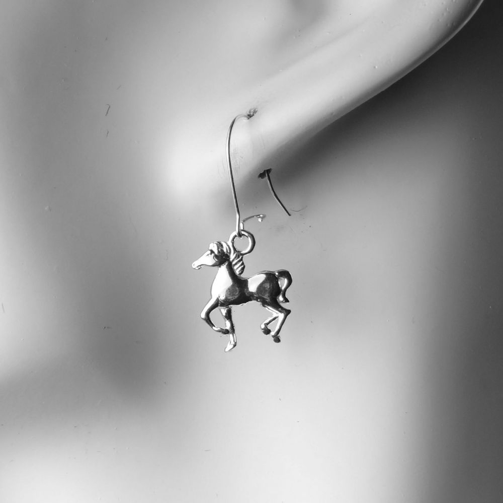 Sterling silver earrings with 14mm horse charms, on either fish or kidney wires, in a gift box