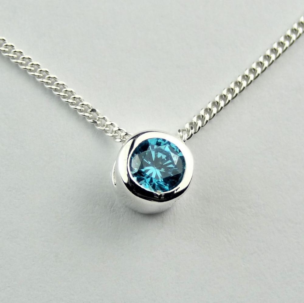 Dainty sterling silver 5mm slider Aqua Cubic Zirconia necklace, in a gift box - choice of 16" or 18" chain, with silver polishing cloth