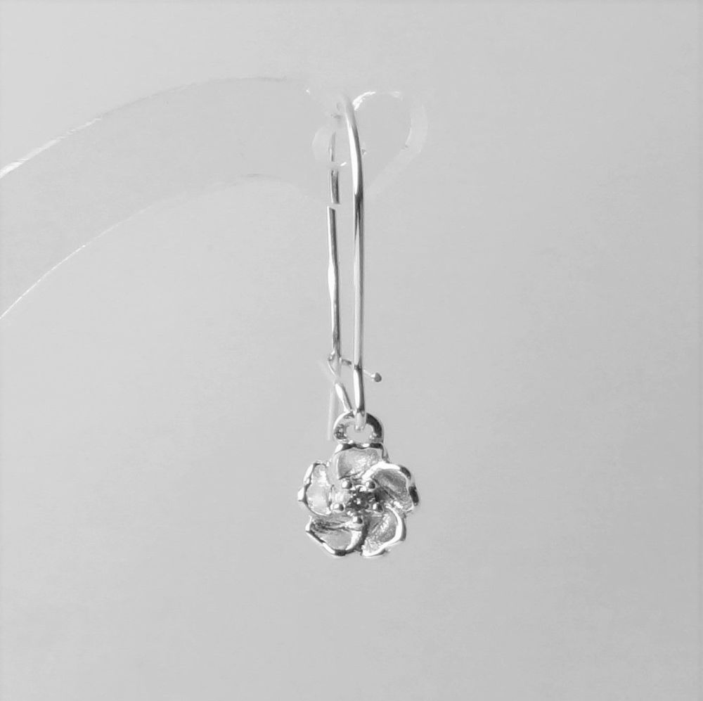 Sterling silver earrings with dainty 5mm flowers with Cubic Zirconia stones, on either fish or kidney wires, in a gift box