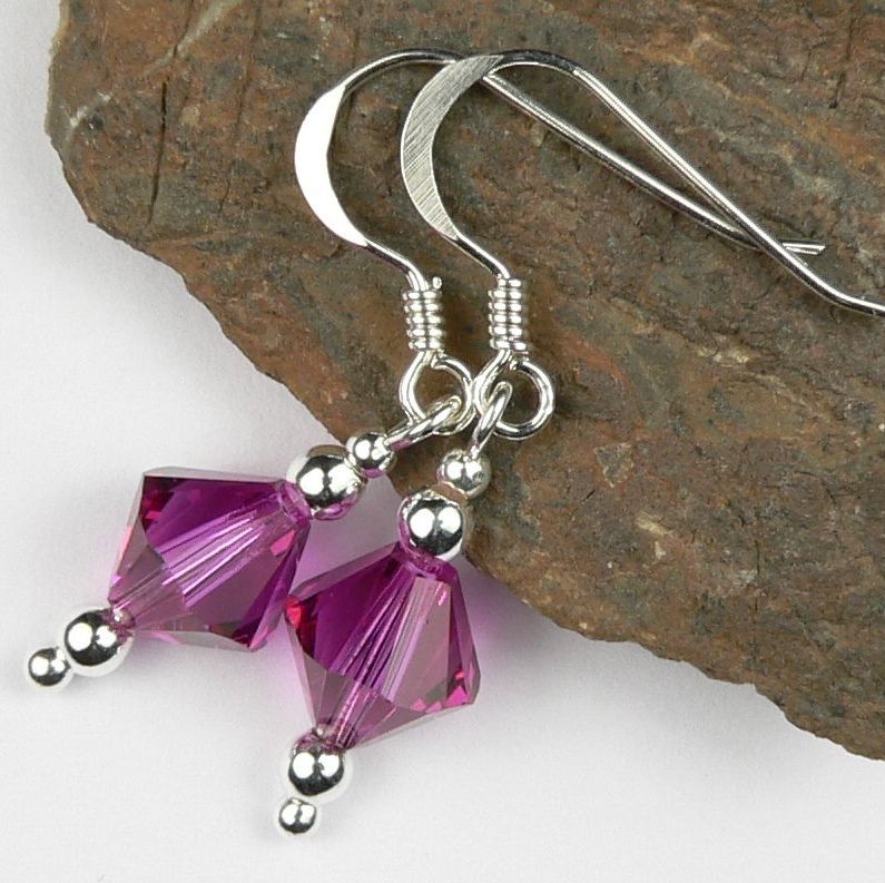 Earrings made with pink purple Fuchsia Swarovski Elements