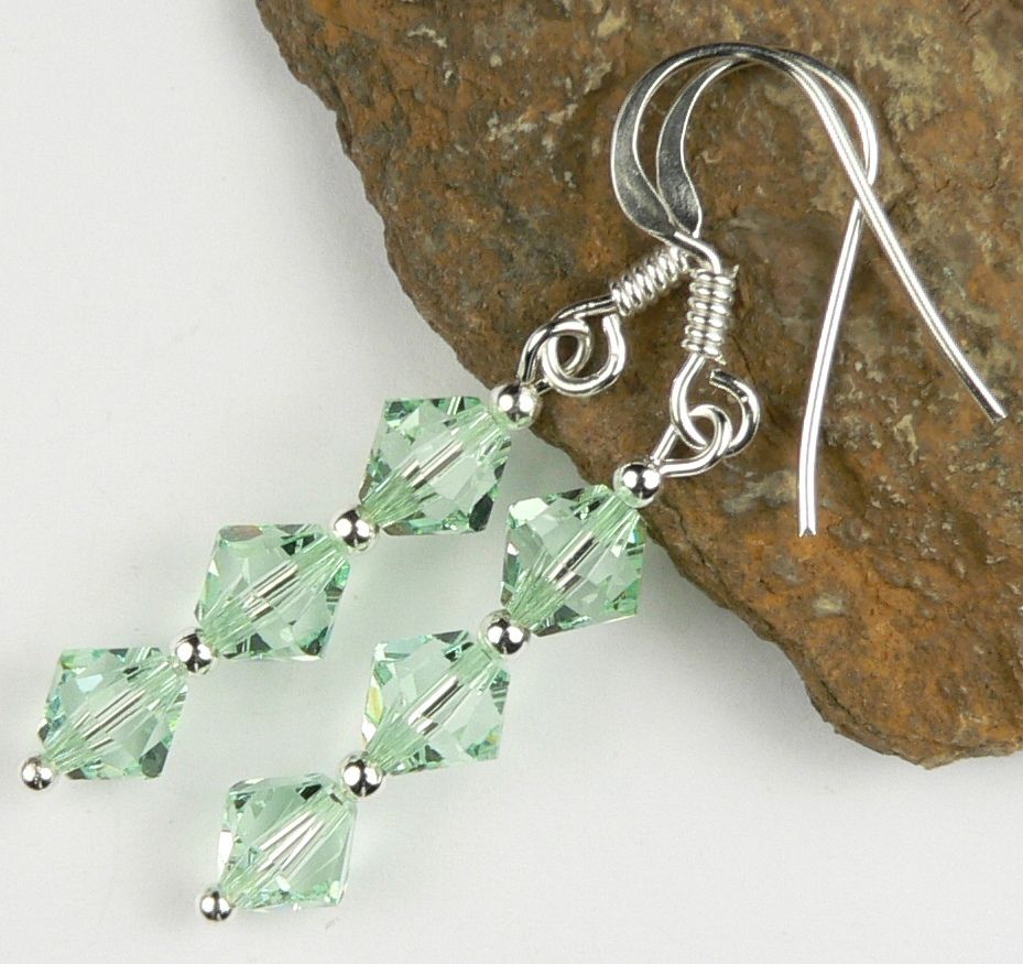 Sterling silver earrings made with 6mm bicone Swarovski Elements in a gift box - Chrysolite (green)