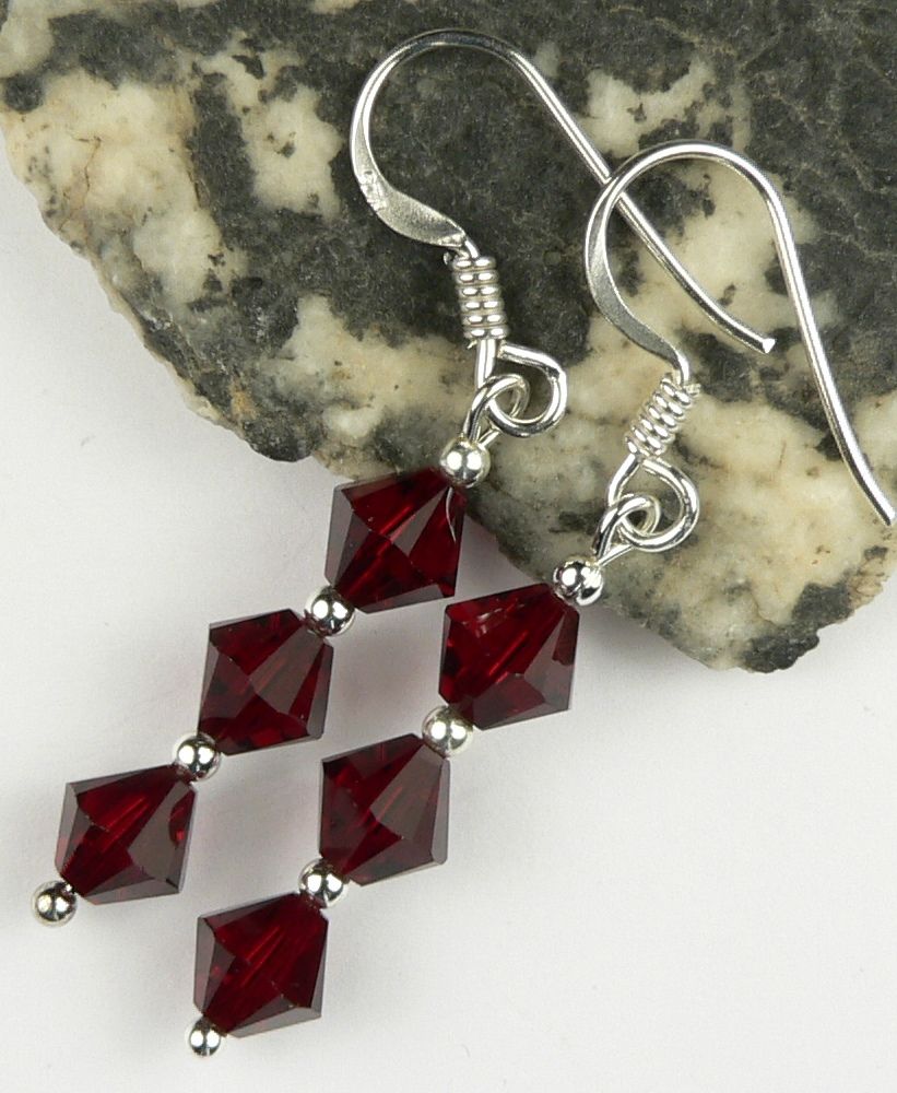 Sterling silver earrings made with 6mm bicone Swarovski Elements in a gift box - Siam (dark red)