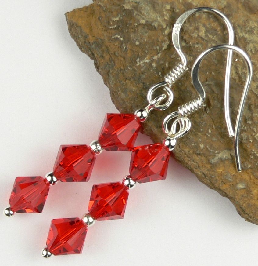 Sterling silver earrings made with 6mm bicone Swarovski Elements in a gift box - Light Siam (red)