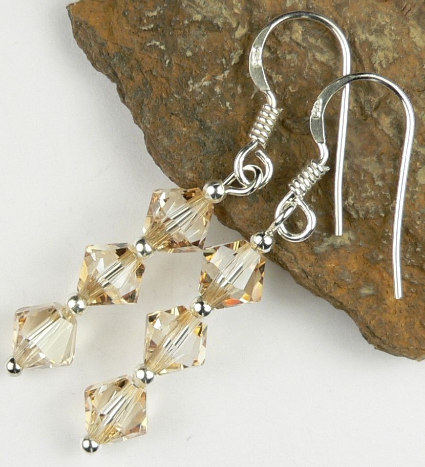 Sterling silver earrings made with 6mm bicone Swarovski Elements in a gift box - Golden Shadow