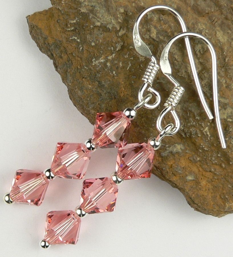 Earrings made with pink Rose Peach Swarovski Elements