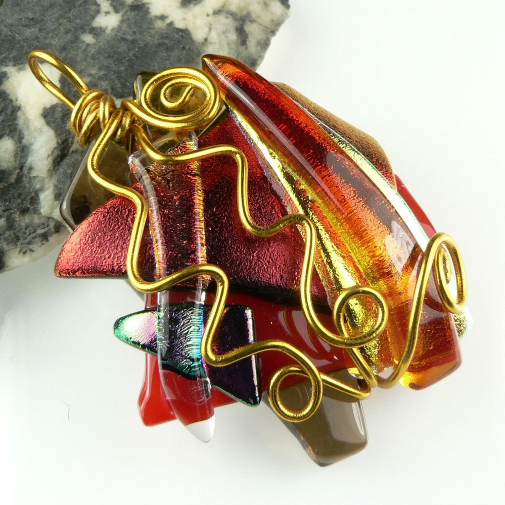 Textured and wire wrapped genuine dichroic glass pendant