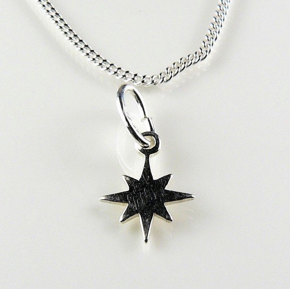 Sterling silver 9mm Pole star necklace on either a 16" or 18" fine curb chain, in a gift box with silver polishing cloth