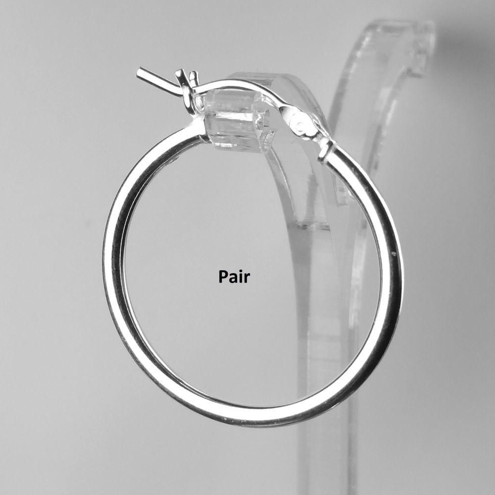 Pair of sterling silver 25mm hinged, hoop earrings, in a gift box with silver polishing cloth