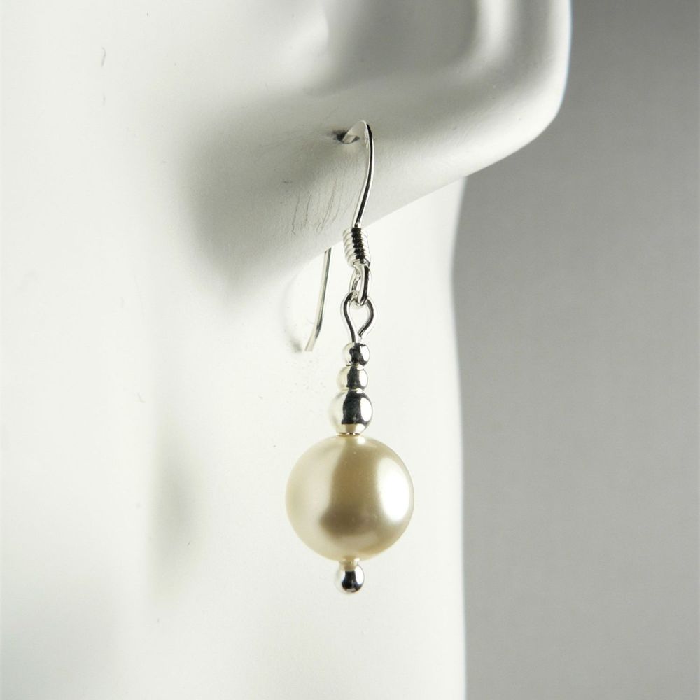 Sterling silver drop earrings made with 8mm cream Swarovski crystal pearls, in a gift box