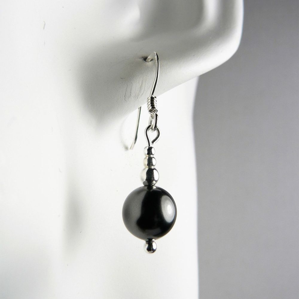 Sterling silver drop earrings made with 8mm black Swarovski crystal pearls, in a gift box