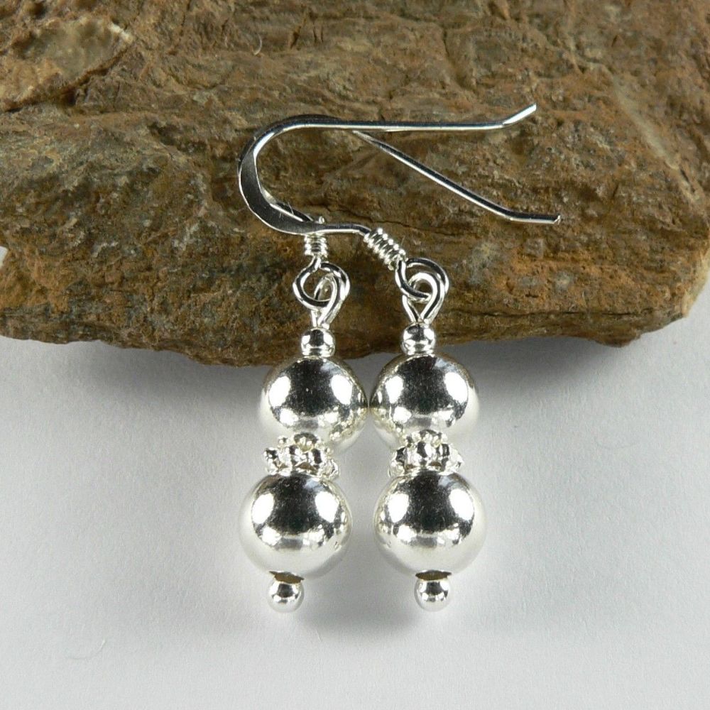 Sterling silver drop earrings, on either fish or kidney wires, in a gift box - beads 6mm with a daisy  (ref 8968)