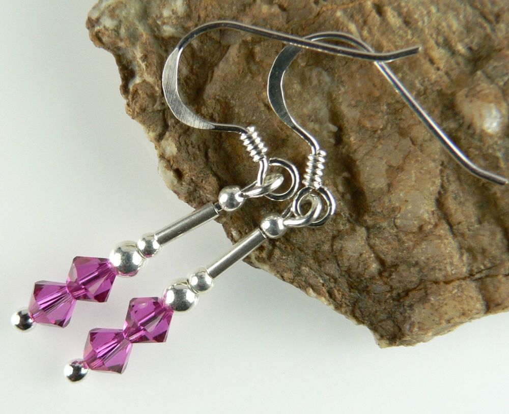 Earrings made with pink purple Fuchsia Swarovski Elements