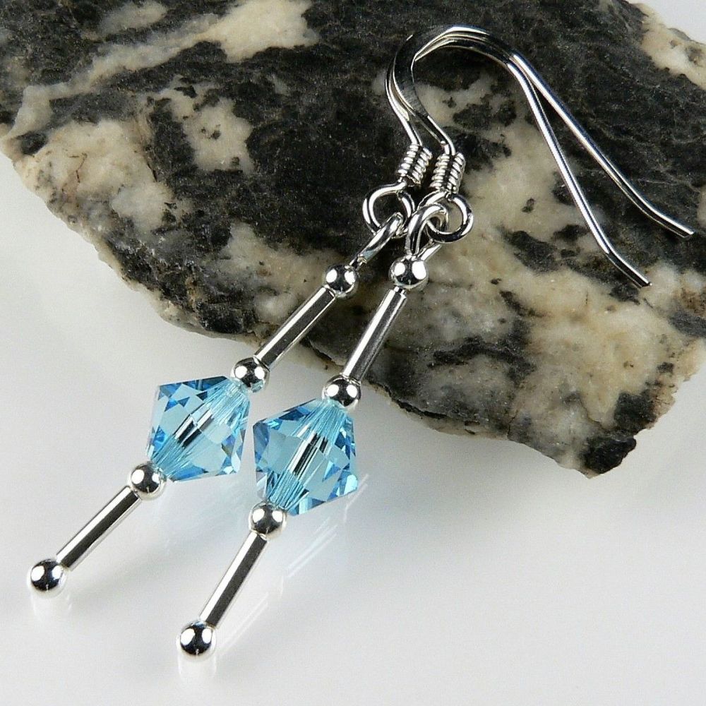 Earrings made with blue Aquamarine Swarovski Elements