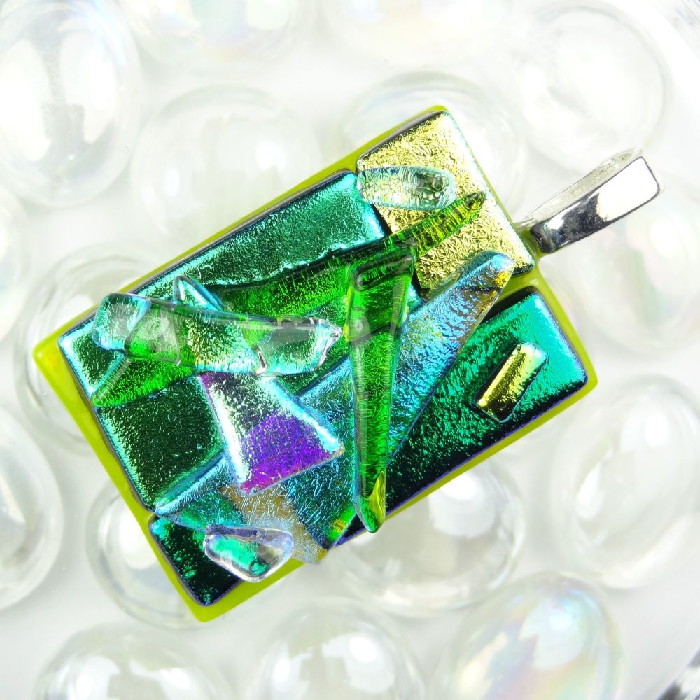 4.5cm shades of green textured Dichroic glass pendant, with leather cord