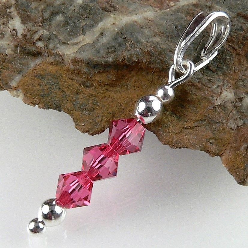 Sterling silver pendant made with 3 Indian Pink Swarovski crystals