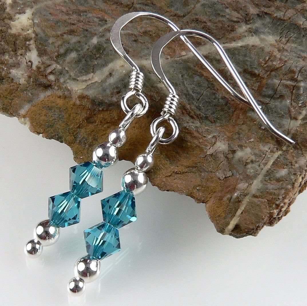 sterling silver earrings made with 4mm bicone blue Indicolite Swarovski  El