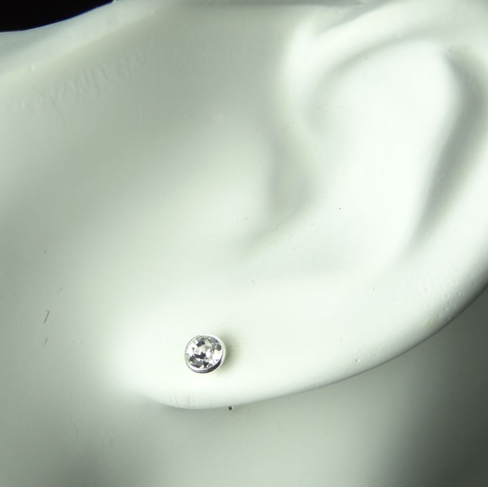 Dainty 4.5mm sterling silver stud earrings made with Swarovski crystals, in a gift box (Crystal coloured/April birthstone)