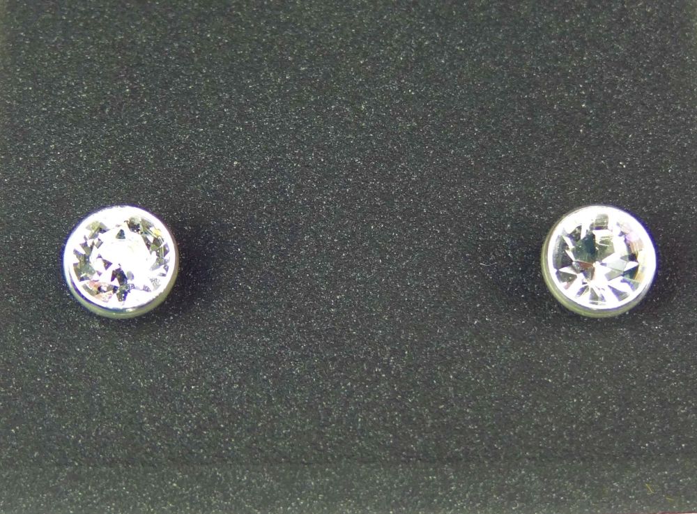 Dainty 4.5mm sterling silver stud earrings made with Swarovski crystals, in a gift box (Crystal coloured/April birthstone)