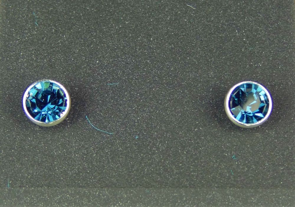 Dainty 4.5mm sterling silver stud earrings made with Swarovski crystals, in a gift box (Blue Zircon coloured/December birthstone)