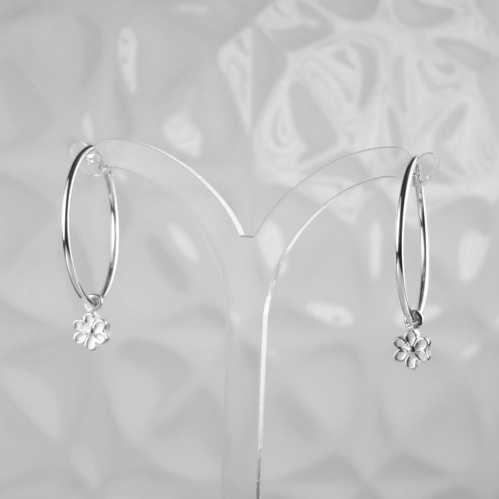 Sterling silver 24mm hoop earrings with dainty/small 5mm double sided daisies, in a gift box