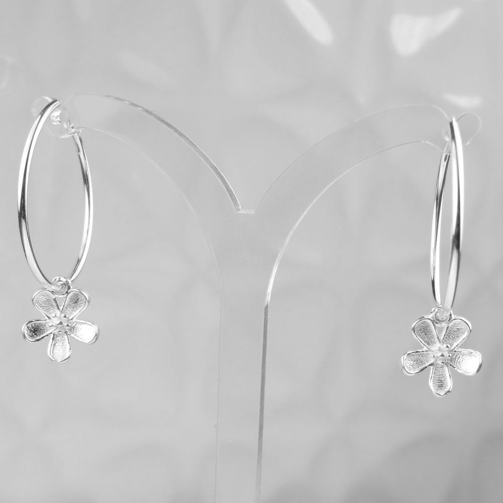 Sterling silver 24mm hoop earrings with 10mm sterling silver flowers, in a gift box
