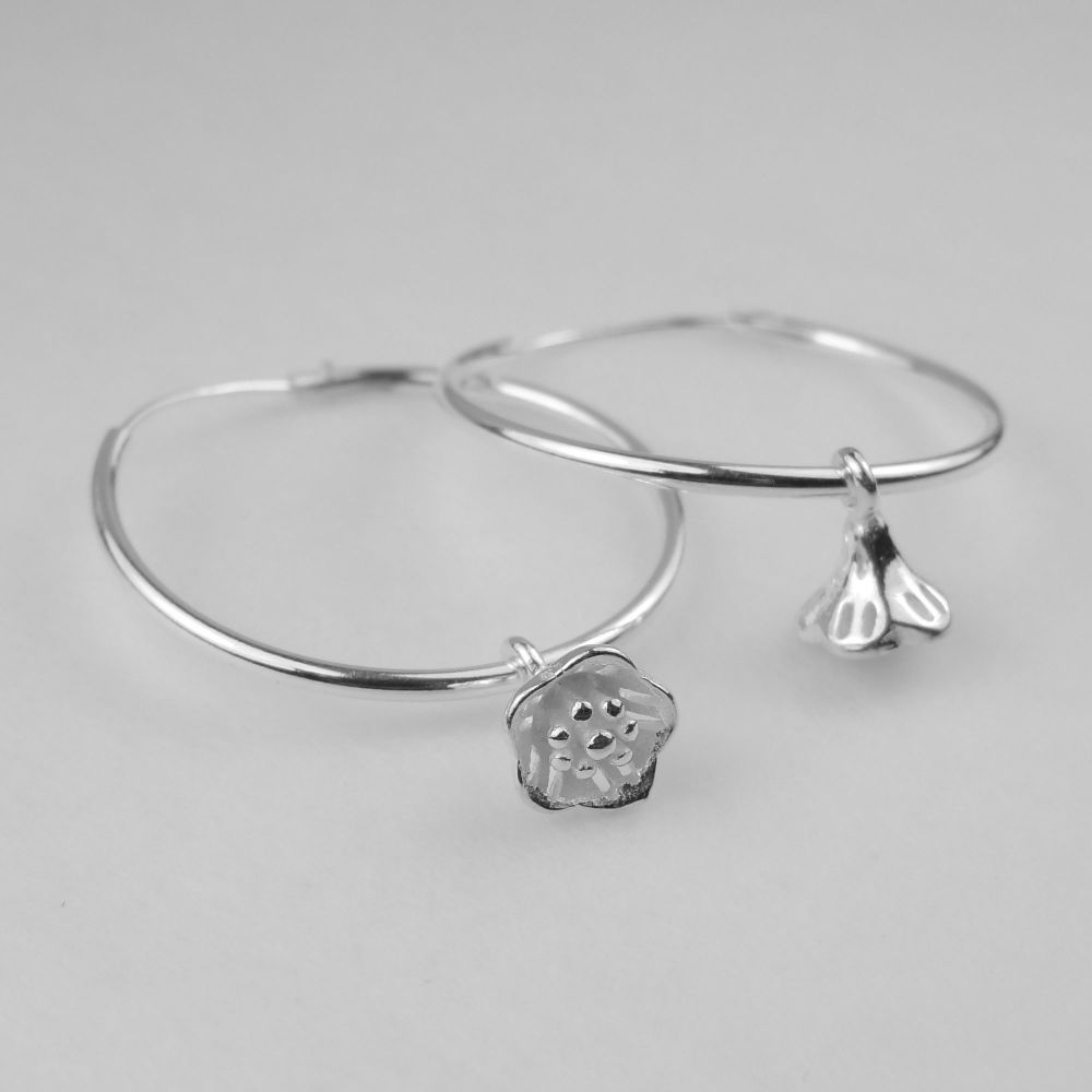 Sterling silver 24mm hoop earrings with 6mm sterling silver hanging flowers, in a gift box