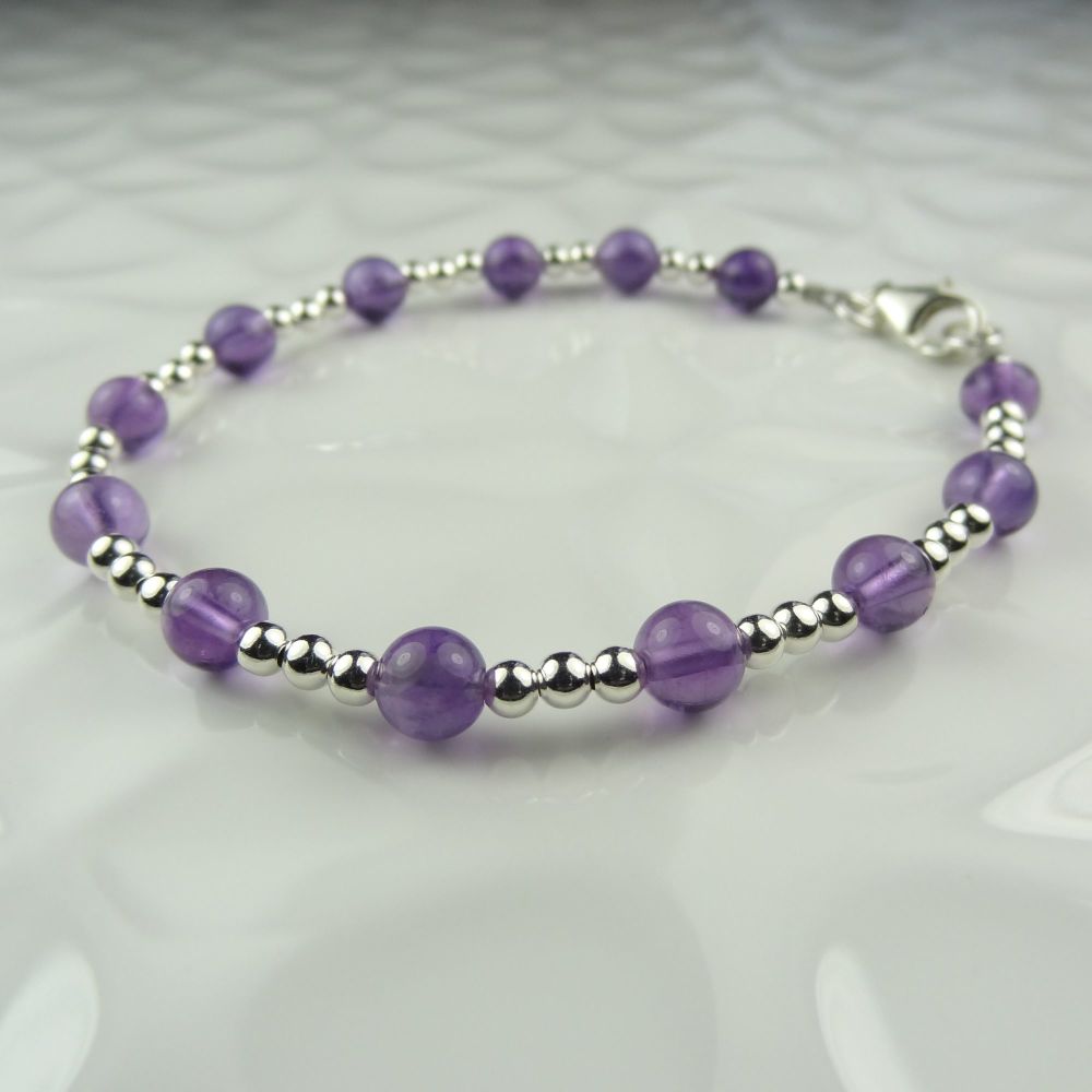 sterling silver bead & 6mm (+/-) purple Amethyst semi-precious stone bracel