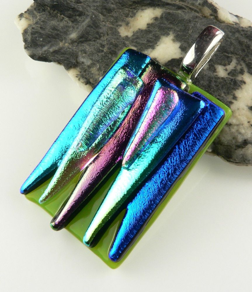 4.6cm multi-coloured textured dichroic glass pendant, with leather cord