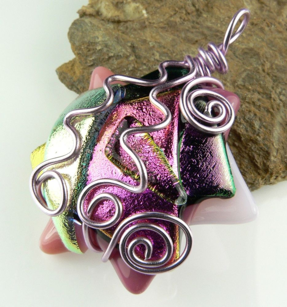 pink textured & wire wrapped Dichroic glass pendant with leather cord