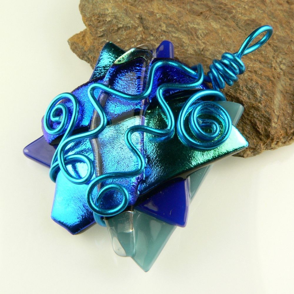 Blue textured & wire wrapped Dichroic glass pendant with leather cord