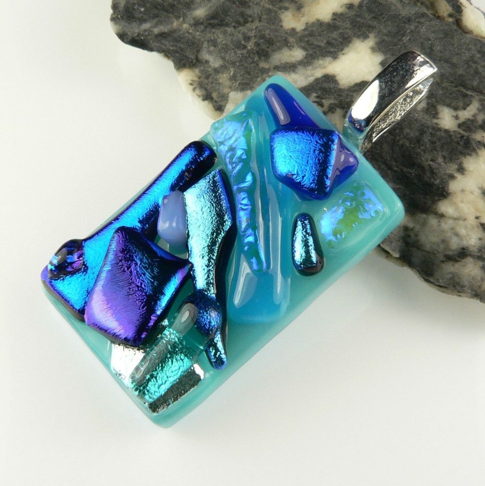 4.3cm blue textured Dichroic glass pendant, with leather cord