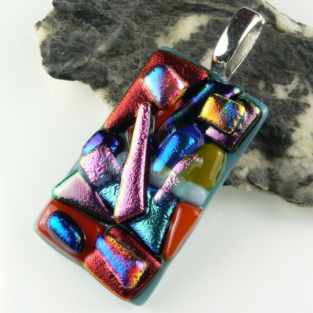 4.6cm multi-coloured textured dichroic glass pendant, with leather cord