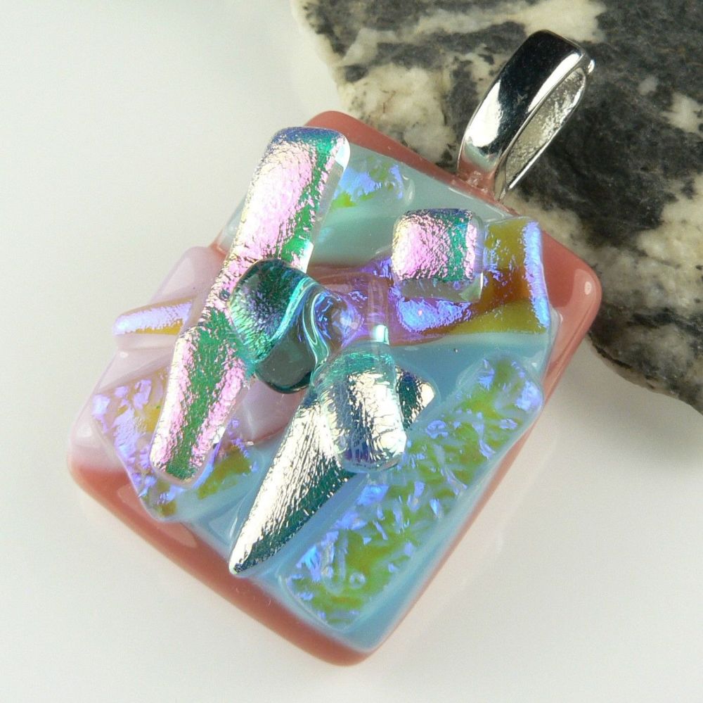 pink textured Dichroic glass pendant, with leather cord